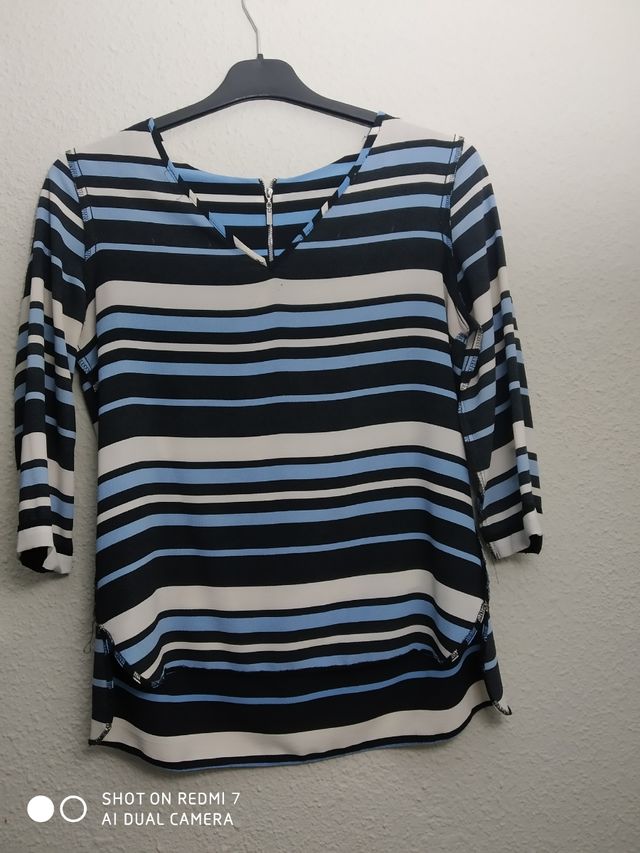 si te llevas 5 blusas12€, si son separadas 4€