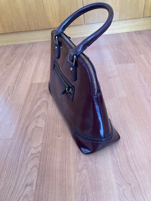 Vendo bolso en color burdeos de Sfera