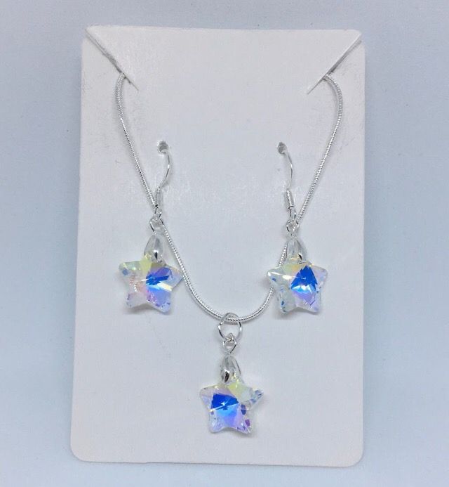 Conjunto estrella de cristal y plata