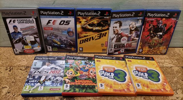 Lote de PlayStation 2 + accesorios + videojuegos