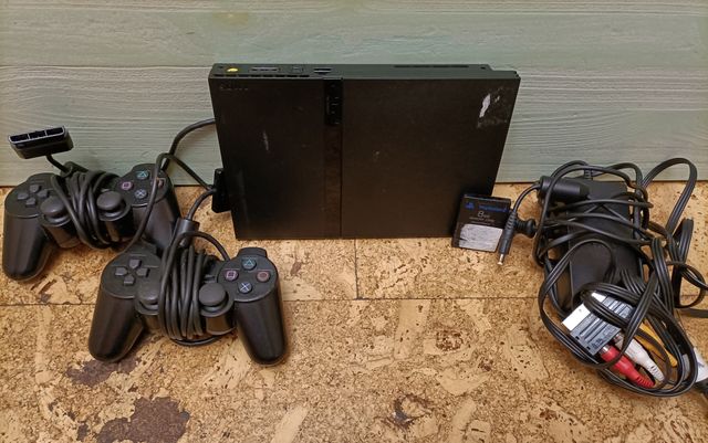 Lote de PlayStation 2 + accesorios + videojuegos