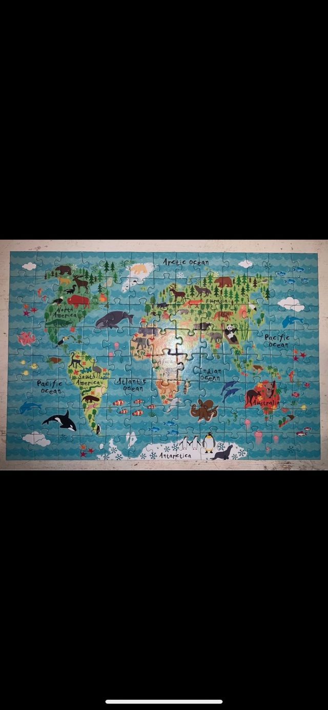 Puzzle mapa mundo animales 