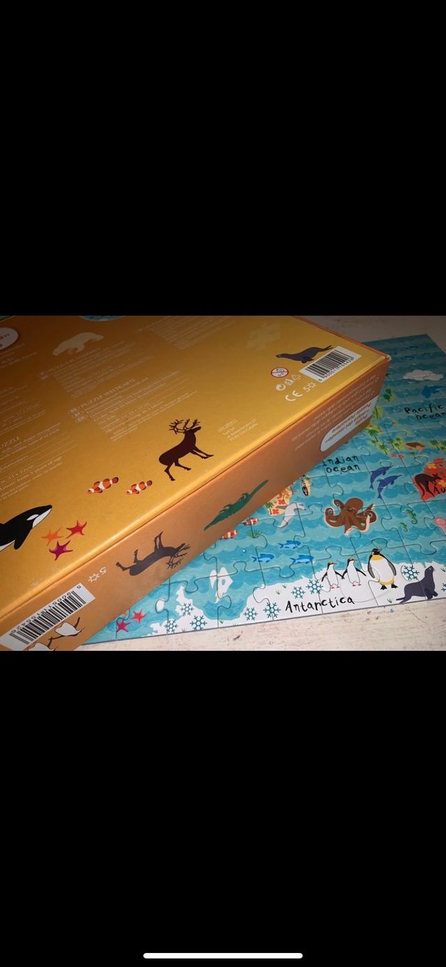 Puzzle mapa mundo animales 