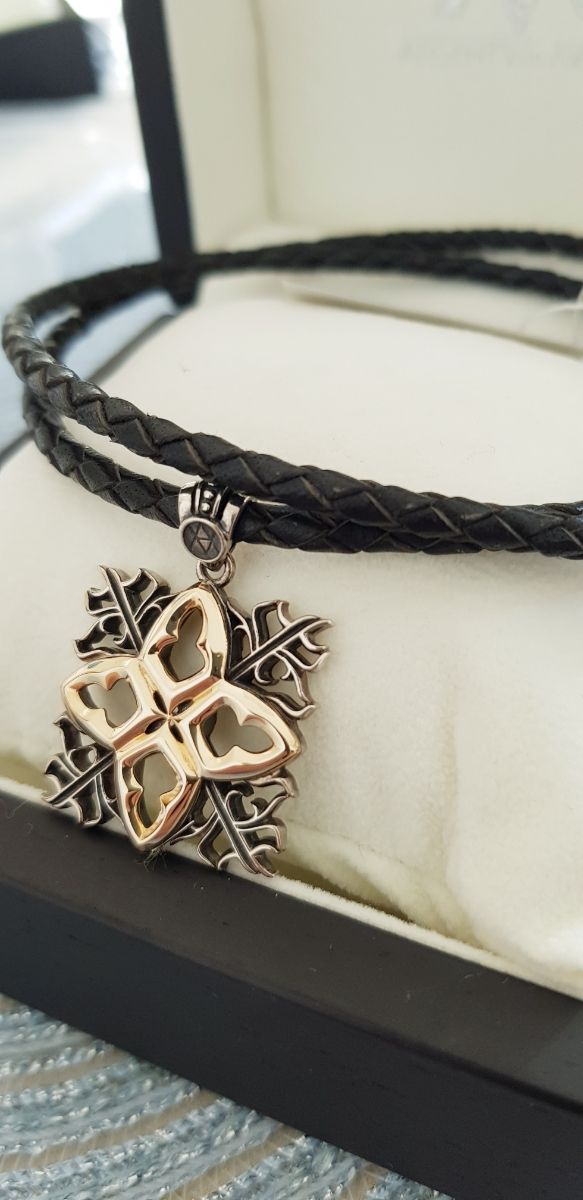 Colgante unisex plata oro piel nuevo a estrenar 