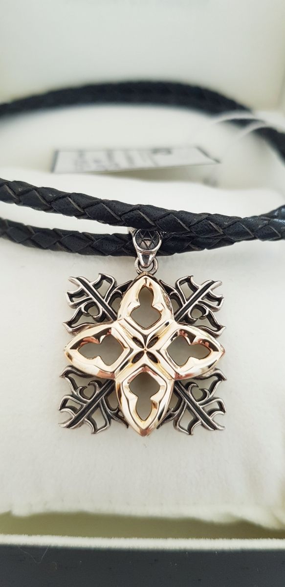 Colgante unisex plata oro piel nuevo a estrenar 