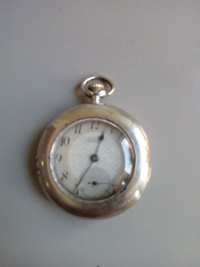 RELOJ DE PLATA