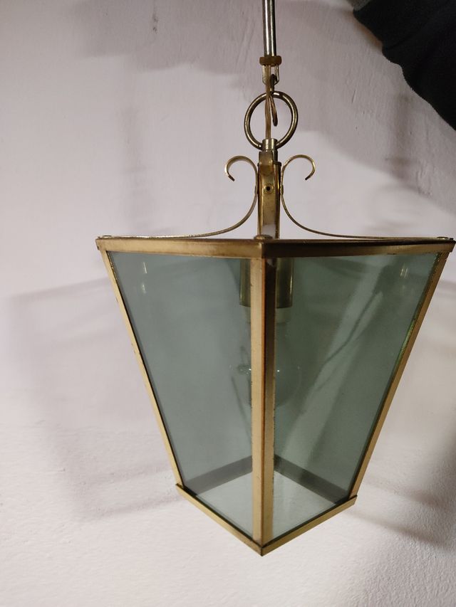 farol de cristal dorado