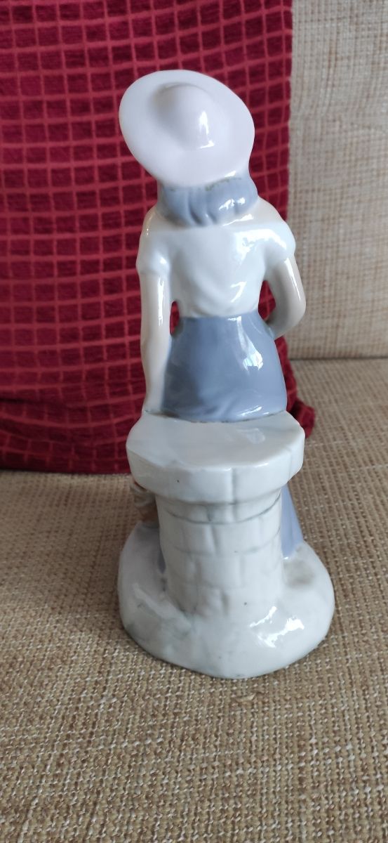 Figura decorativa de porcelana