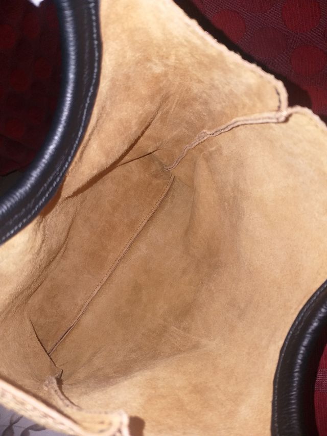 bolso marron y negro piel serpiente