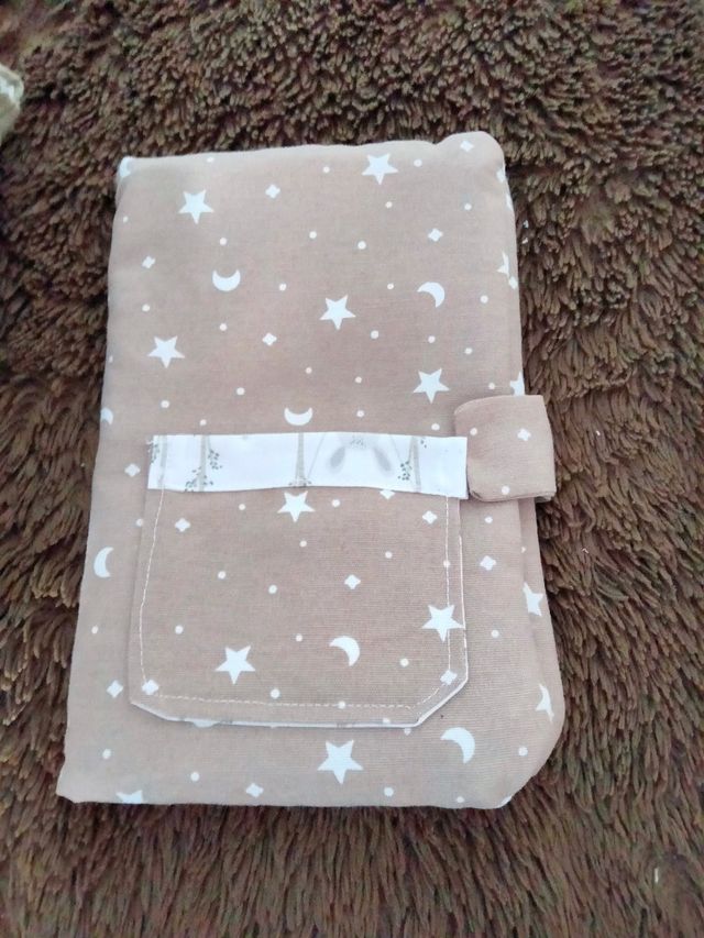 cambiador y cartera de pañales y toallitas