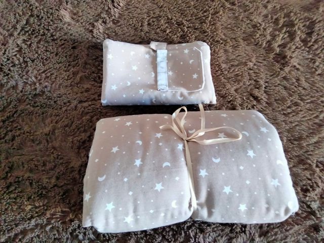 cambiador y cartera de pañales y toallitas