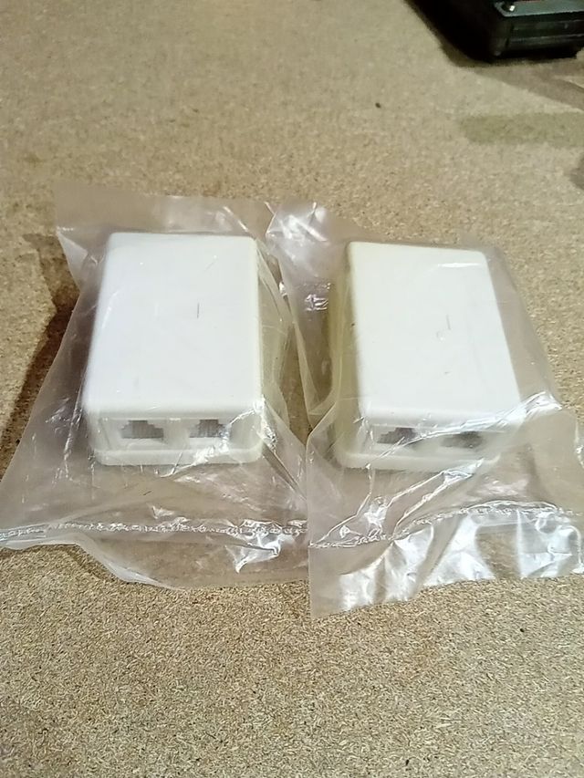 Toma teléfono doble