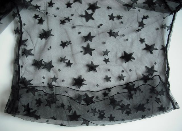 Top negro de estrellas