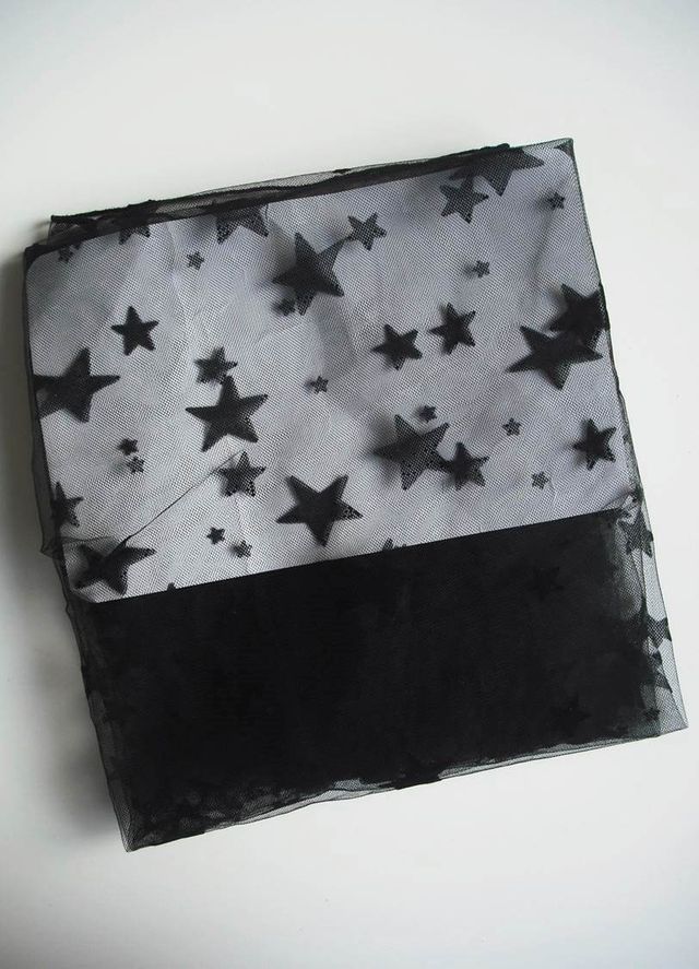 Top negro de estrellas