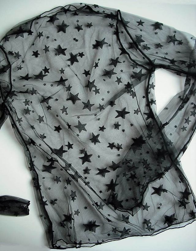 Top negro de estrellas