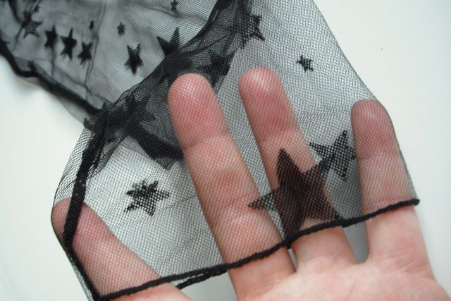 Top negro de estrellas