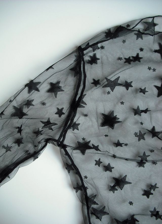 Top negro de estrellas