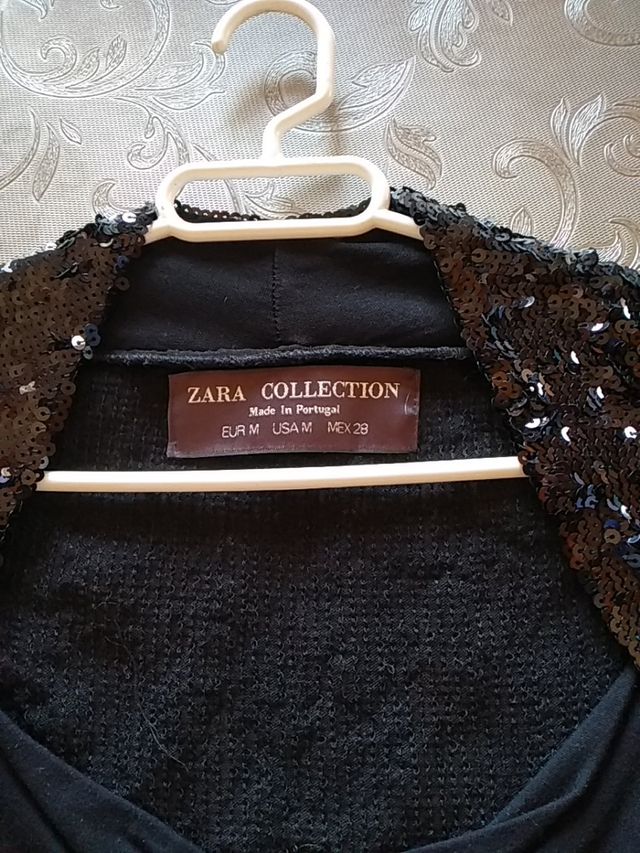 Camiseta con lentejuelas. Usado MUY poco.