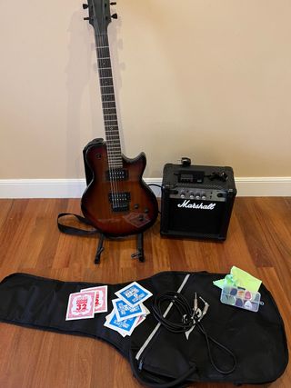 Guitarra eléctrica LAG con amplificador de segunda mano por 149 EUR en  Portugalete en WALLAPOP
