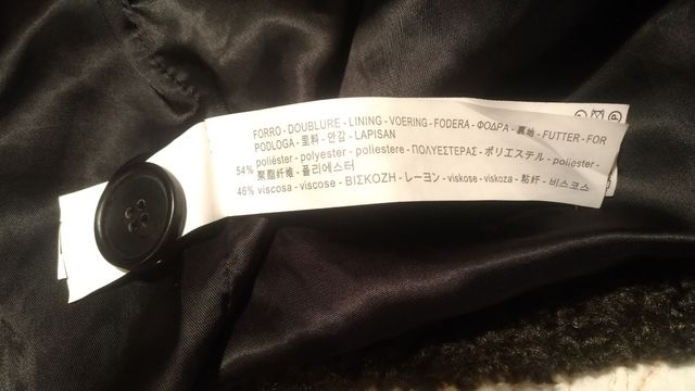 abrigo verde oscuro Zara