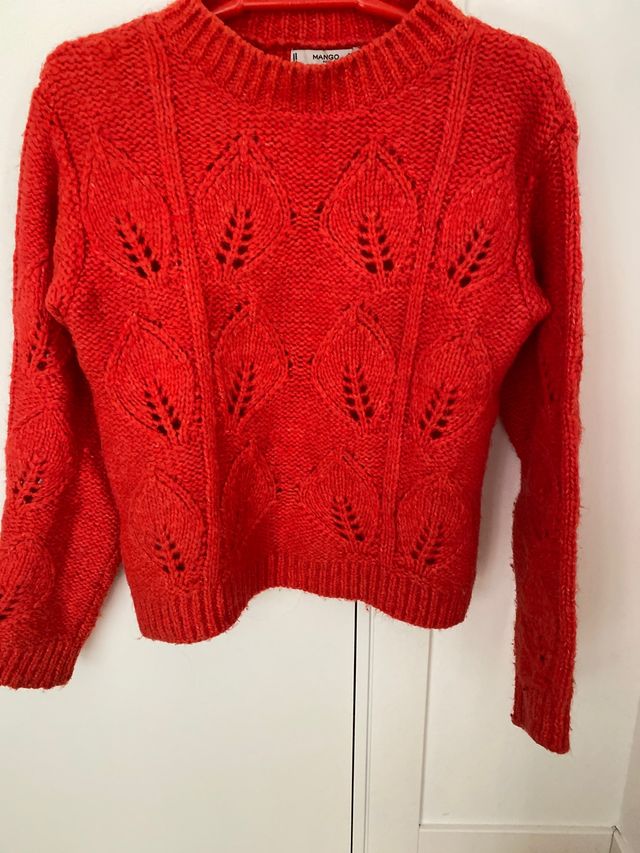 Jersey de color naranja.Talla S.