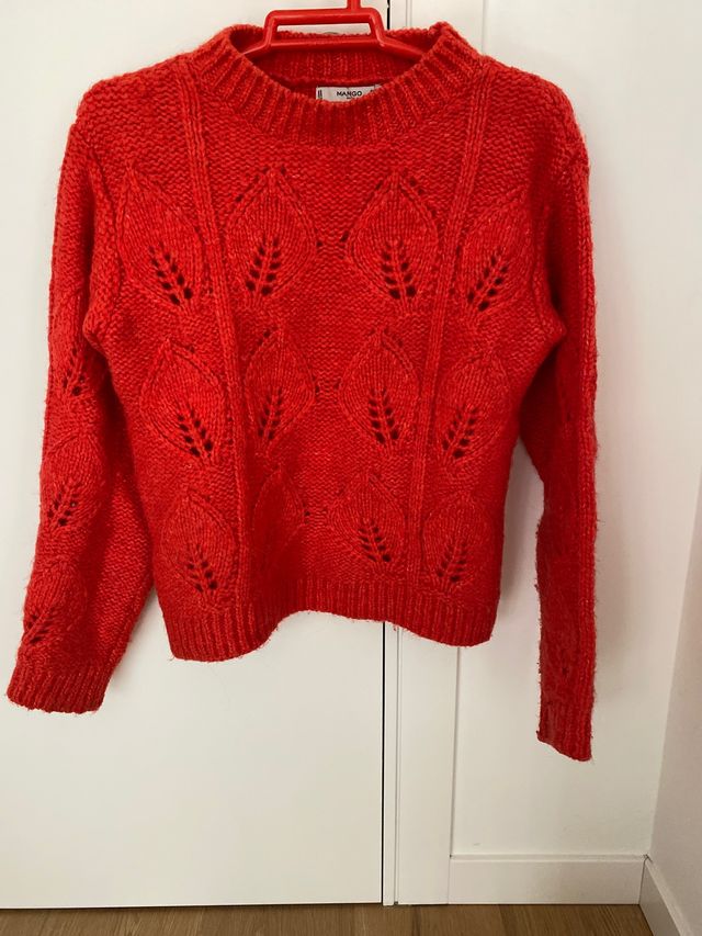 Jersey de color naranja.Talla S.