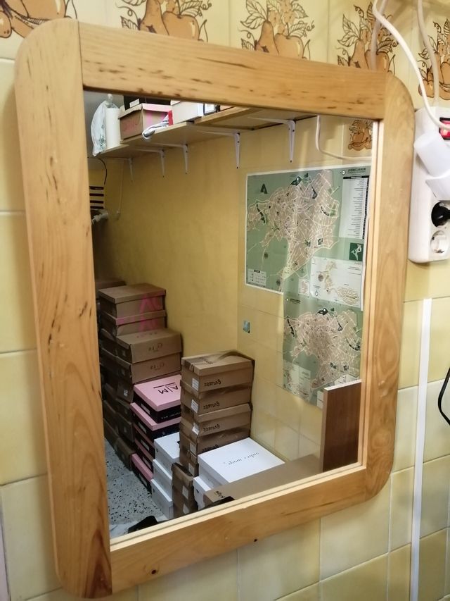 Espejo de madera.