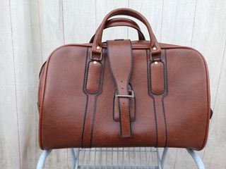 Maleta de mano de piel de segunda mano por 35 EUR en Capellades en WALLAPOP