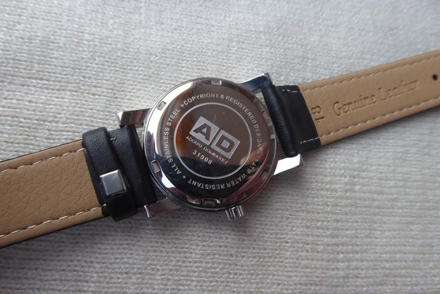 RELOJ ADOLFO DOMÍNGUEZ QUARTZ,UNISEX, ESFERA NEGRA