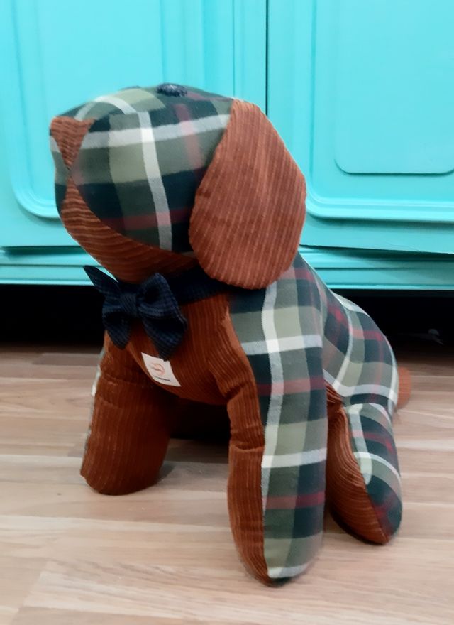 perro sujetapuertas o maniquí