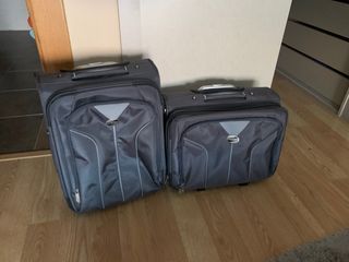 Par de maletas American tourist de segunda mano por 60 EUR en Torre de  Benagalbon en WALLAPOP
