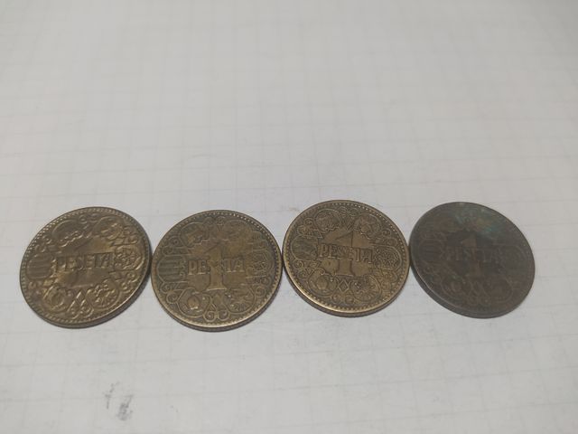4 monedas de 1 peseta de 1944