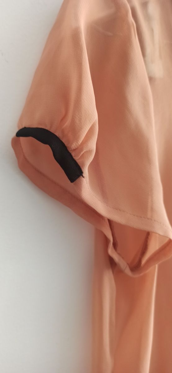 Blusa manga corta rosa con cuello baby de Zara