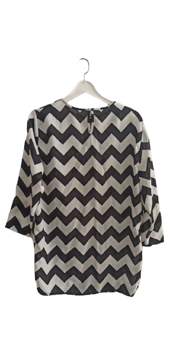 Camisa oversize manga 3/4 rayas blancas y negras