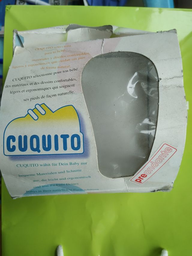 Botitas blancas de piel de Bebé