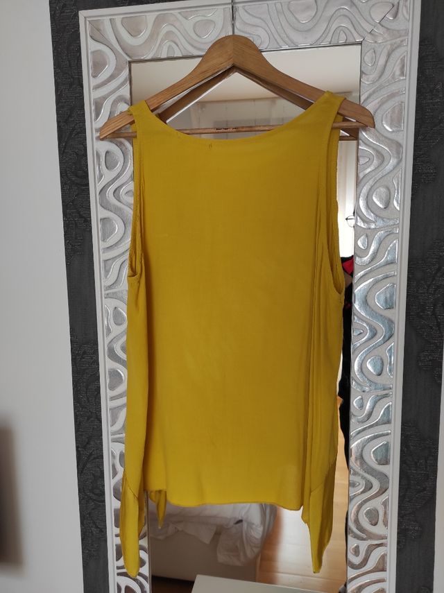 Blusa, mai indossata