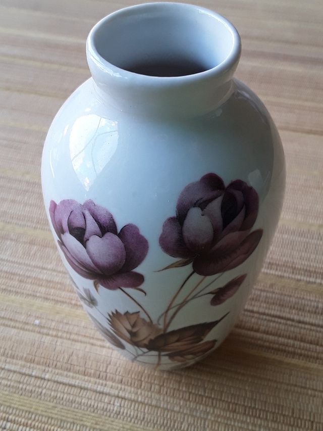 Jarroncito de cerámica con flores