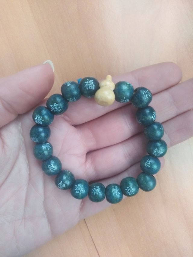 Lote  5 pulseras de bolitas con letras orientales