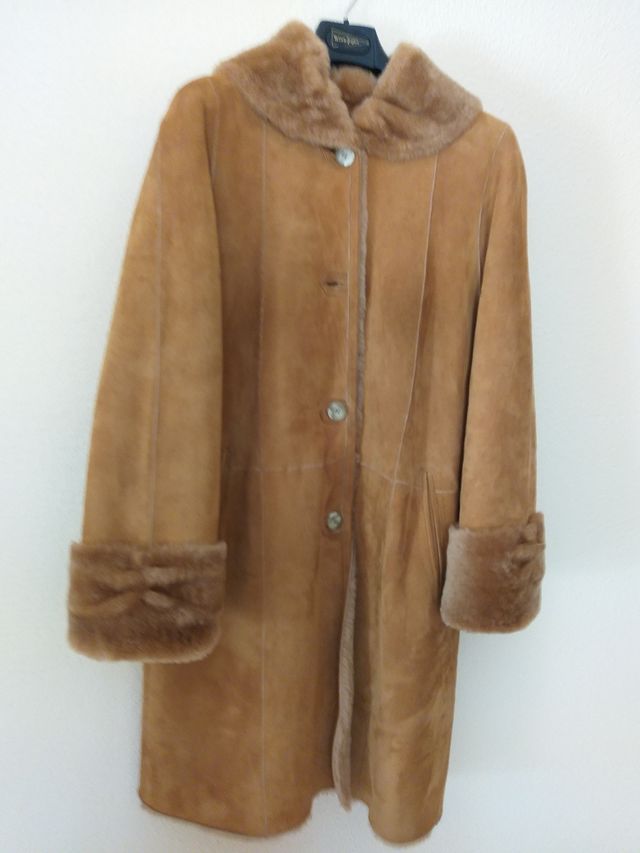 abrigo de piel vuelta