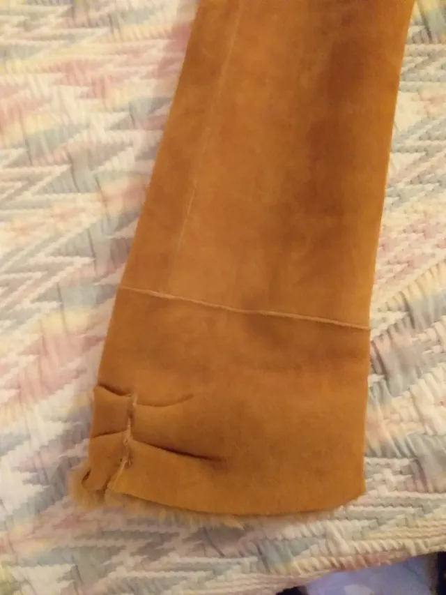 abrigo de piel vuelta