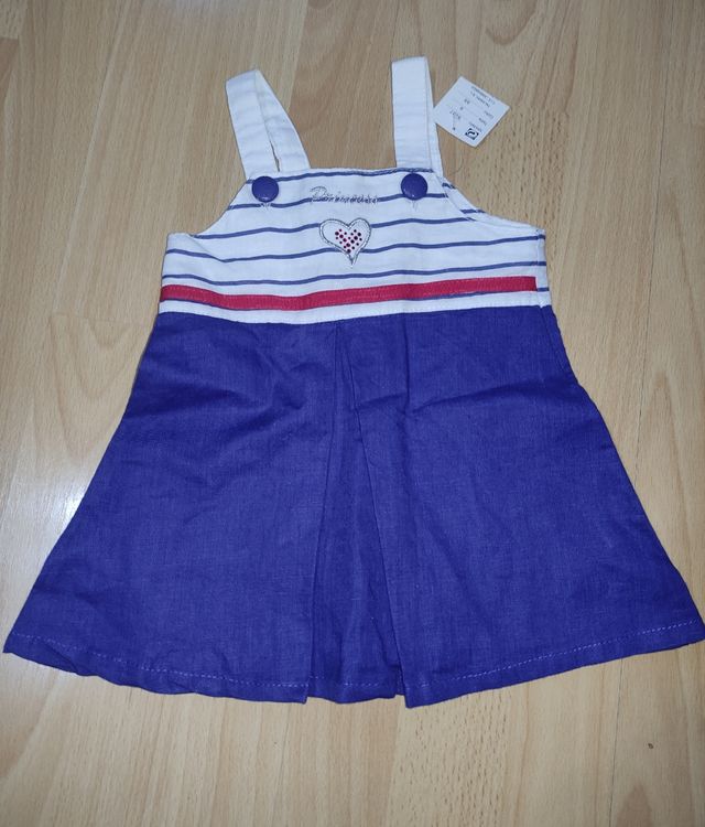 Conjunto vestido y chaqueta de bebe nuevos