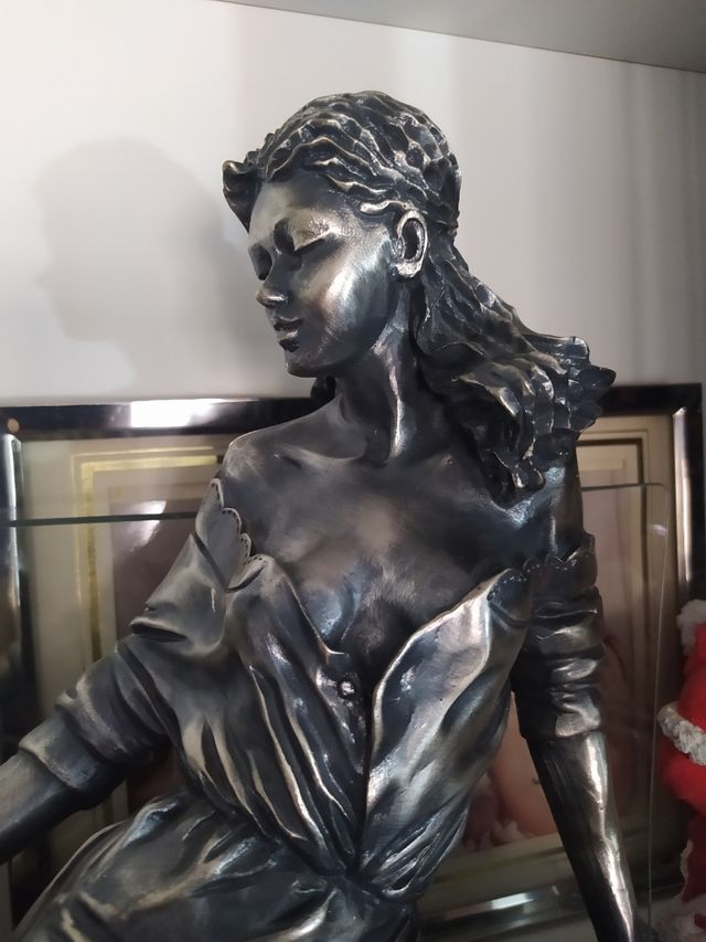 Escultura dama