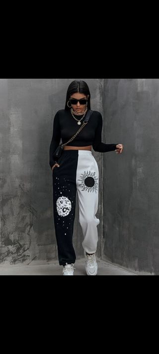 Pantalones de chándal blanco y negro de shein de segunda mano por 12 EUR en  Las Palmas de Gran Canaria en WALLAPOP