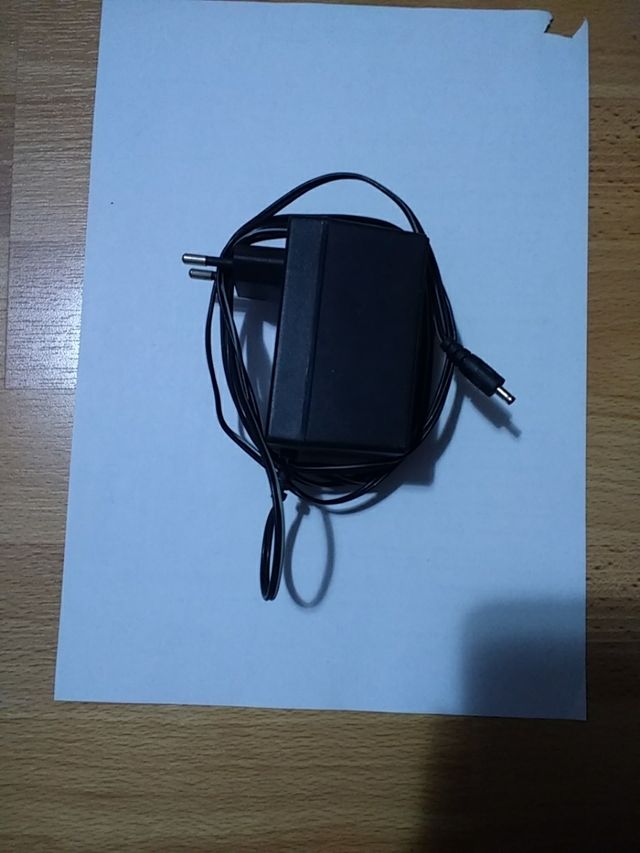 Cargador 7,5V 1A.