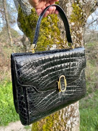 Bolso de cocodrilo negro vintage de segunda mano por 140 EUR en Alpedrete  en WALLAPOP