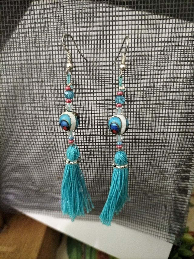 orecchino con perle e fiocco