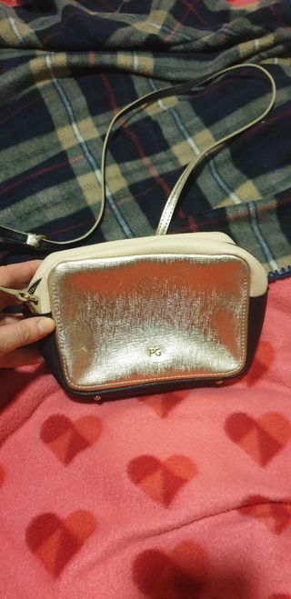 Bandolera negra y dorada Purificación Garcia de segunda mano por 30 EUR en  Ourense en WALLAPOP