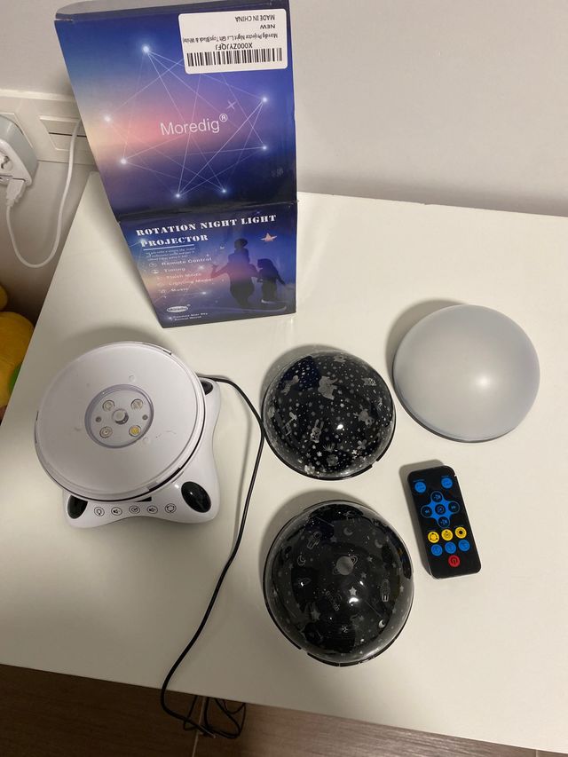 Proyector de luz de noche giratoria