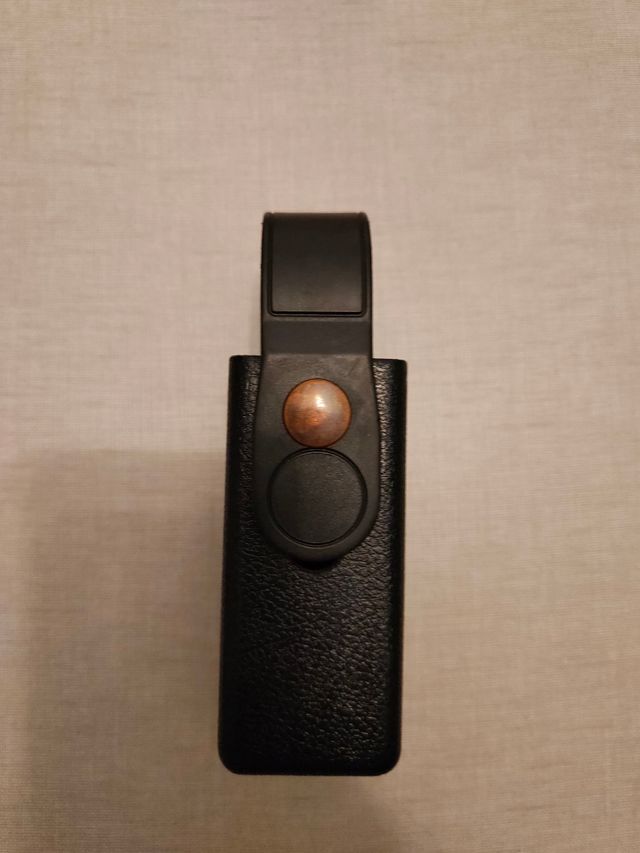 Portacargador de polímero