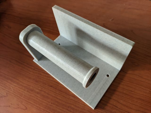 Soporte papel baño con bandeja para movil.